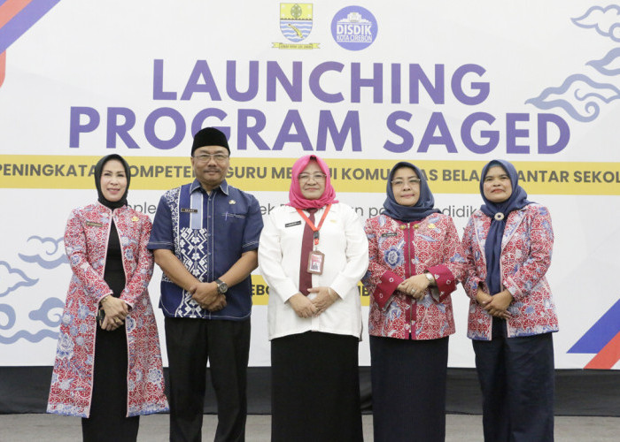 HARMONIS: Kepala Disdik Kadini didampingi Sekretaris Disdik Sujana, dan para Kepala Bidang Disdik, foto bersama usai kegiatan launching SAGED, yang merupakan proyek perubahan pada Pendidikan Kepemimpinan Nasional Tingkat II Angkatan 26 Tahun 2024.