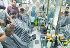 Pangkas Rambut Gratis dari Relawan Eti-Suhendrik 